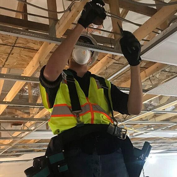 Connections Academy student Neil working as an electrical contractor. 